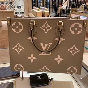 On the Go MM Empreinte Leather Dove/Beige Color